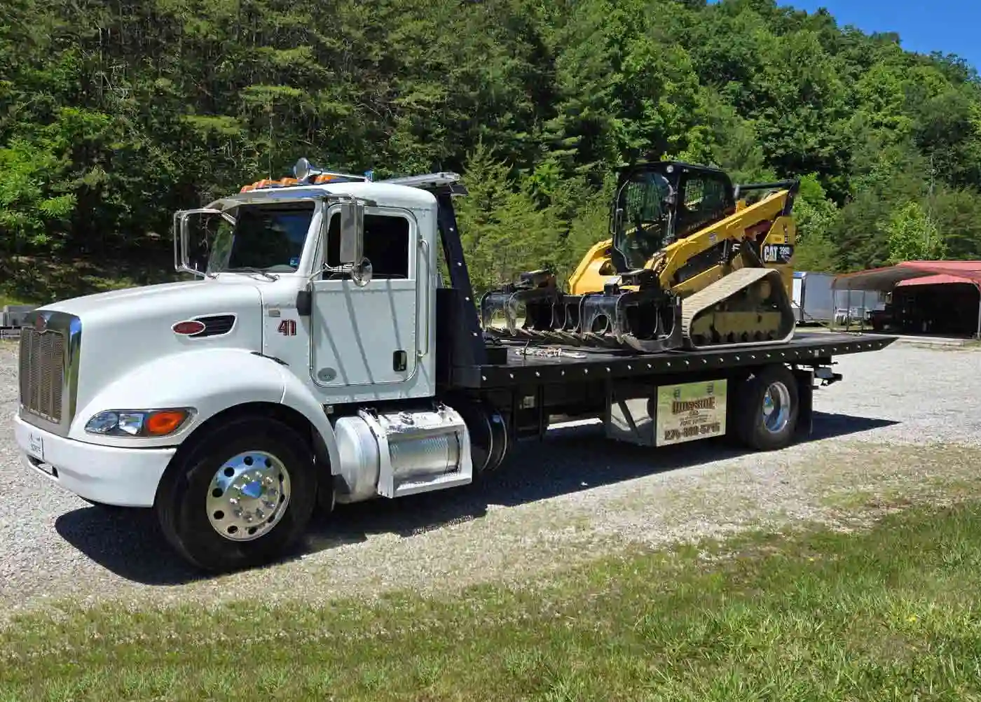Compact equipment on a Wayside rollback