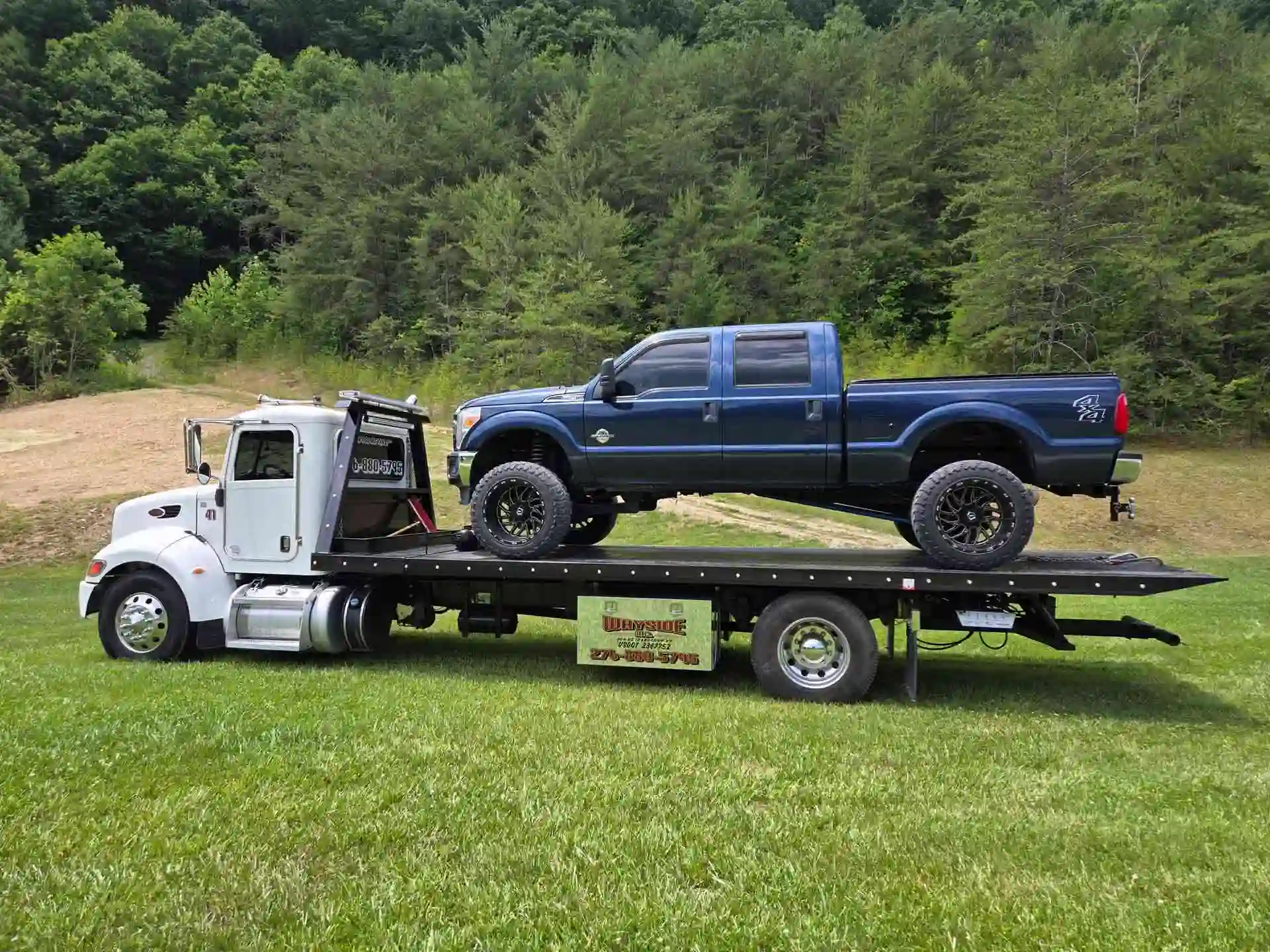 Pickup truck on a Wayside rollback
